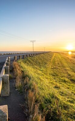 Solopgang over dæmningen mellem Rømø og Jylland